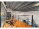 Stylish loft seating area with hardwood floors and natural light from large windows at 62 W Colonial Dr # 302, Orlando, FL 32801
