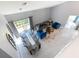Bright living room featuring high ceilings, stylish furniture, and modern decor at 8130 Yellow Crane Dr, Kissimmee, FL 34747
