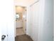 Hallway with a bathroom view and an adjacent closet at 953 Waterfall Blvd, Davenport, FL 33837