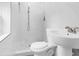 Renovated bathroom features tiled walls, mosaic floors, and modern fixtures at 1211 Dorothy St, Lakeland, FL 33815
