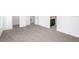 Primary bedroom with en-suite bathroom and carpet at 1270 3Rd W St, Orange City, FL 32763