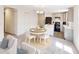 Casual dining area with round table and chairs, adjacent to kitchen at 1270 3Rd W St, Orange City, FL 32763