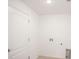Simple laundry room with washer and dryer hookups at 1270 3Rd W St, Orange City, FL 32763