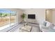 Living room with sliding glass doors opening to backyard at 1270 3Rd W St, Orange City, FL 32763
