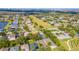 An aerial view of a neighborhood featuring green spaces and single-Gathering homes at 12918 Hunters Vista Blvd, Orlando, FL 32837