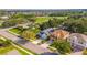 Birds eye view of a single Gathering residence from afar, located near a green space and surrounded by mature landscaping at 12918 Hunters Vista Blvd, Orlando, FL 32837