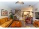 Bright living room featuring hardwood floors and an open concept layout at 12918 Hunters Vista Blvd, Orlando, FL 32837