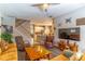 Warm and inviting living room featuring hardwood floors and an open concept layout at 12918 Hunters Vista Blvd, Orlando, FL 32837