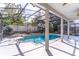 The screened-in pool features a deck and handrails, creating a relaxing outdoor entertainment and recreational space at 12918 Hunters Vista Blvd, Orlando, FL 32837