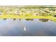 Aerial shot showcasing property's lakefront location at 1332 Hunterman Lane, Winter Garden, FL 34787