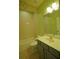 Traditional bathroom with a combined tub and shower and vanity with sink at 1332 Hunterman Lane, Winter Garden, FL 34787