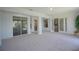 Open concept living area with access to multiple rooms and scenic views at 1332 Hunterman Lane, Winter Garden, FL 34787