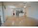 Bright living space with open floor plan, connecting to the kitchen with tiled flooring throughout at 1332 Hunterman Lane, Winter Garden, FL 34787