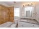 Clean bathroom with tile shower, granite countertop at 14424 Quail Trail Ct, Orlando, FL 32837