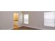 Bedroom with en-suite bathroom and hardwood floors at 14424 Quail Trail Ct, Orlando, FL 32837