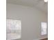 Bright bedroom with hardwood floors and two windows at 14424 Quail Trail Ct, Orlando, FL 32837
