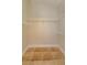 Large walk-in closet with wire shelving and tile floor at 14424 Quail Trail Ct, Orlando, FL 32837