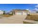 Attractive single-Gathering home boasting a three-car garage, well-maintained lawn, and inviting curb appeal at 14436 Topaghan Way, Winter Garden, FL 34787
