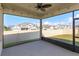 Relaxing screened lanai overlooking the backyard and the surrounding neighborhood at 14436 Topaghan Way, Winter Garden, FL 34787