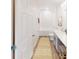 Clean bathroom with a bathtub, single vanity, and wood-like flooring at 1523 5Th Ave, Deland, FL 32724