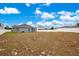 Spacious backyard with a grassy area at 2011 Begonia Way, Poinciana, FL 34759