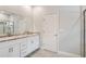 Bathroom with double vanity and granite countertop at 2011 Begonia Way, Poinciana, FL 34759
