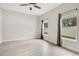 Bright bedroom with tile floors and large windows at 2011 Begonia Way, Poinciana, FL 34759