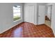 Bedroom with tile floors, closet and access to another room at 203 San Gabriel St, Winter Springs, FL 32708