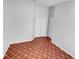 Bright bedroom with tile floors and double door closet at 203 San Gabriel St, Winter Springs, FL 32708
