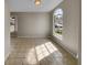Spacious dining area with tile floors and large windows at 203 San Gabriel St, Winter Springs, FL 32708
