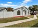 Well-maintained house with a fenced yard and driveway at 203 San Gabriel St, Winter Springs, FL 32708