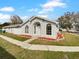 Newly renovated home with a landscaped front yard and walkway at 203 San Gabriel St, Winter Springs, FL 32708