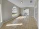 Spacious living area with tile floors and access to backyard at 203 San Gabriel St, Winter Springs, FL 32708