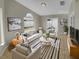 Bright living room with comfy seating and tiled floors at 203 San Gabriel St, Winter Springs, FL 32708