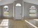 Bright living room with tile floors and large windows at 203 San Gabriel St, Winter Springs, FL 32708