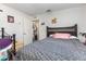View of a well lit bedroom with decorations and furniture at 2357 Palm Way, Oviedo, FL 32765