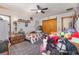 Bedroom with a ceiling fan and lots of personal decor at 2357 Palm Way, Oviedo, FL 32765