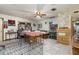 Bright dining area featuring tile flooring, ample natural light, and an open layout at 2357 Palm Way, Oviedo, FL 32765