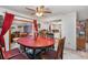 Open-concept kitchen and dining area with tile floors and a bright, functional layout at 2357 Palm Way, Oviedo, FL 32765