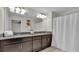 Modern bathroom with double vanity and large shower at 3097 Pequod Pl, Kissimmee, FL 34746