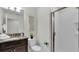 Clean bathroom with shower and granite countertop at 3097 Pequod Pl, Kissimmee, FL 34746