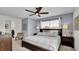 Main bedroom with large bed and ensuite bathroom at 3097 Pequod Pl, Kissimmee, FL 34746