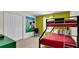 bedroom with bunk bed and Mickey Mouse decor at 3097 Pequod Pl, Kissimmee, FL 34746