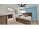 Bedroom with a queen bed and view of the bathroom at 3097 Pequod Pl, Kissimmee, FL 34746