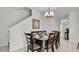 Elegant dining room with a dark wood table and six chairs at 3097 Pequod Pl, Kissimmee, FL 34746
