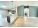 Modern kitchen with gray cabinets and granite countertop at 333 E Church St, Deland, FL 32724