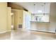 Open living room with high ceilings and a view into the kitchen at 333 E Church St, Deland, FL 32724