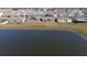 Aerial view showing house and lake at 4390 Bull St, St Cloud, FL 34772