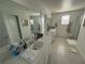Modern bathroom with a large vanity and walk-in shower at 4390 Bull St, St Cloud, FL 34772
