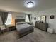 Spacious bedroom with a dresser and large bed at 4390 Bull St, St Cloud, FL 34772